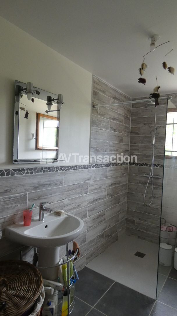 Maison de plain pied sur 1325 m² de jardin