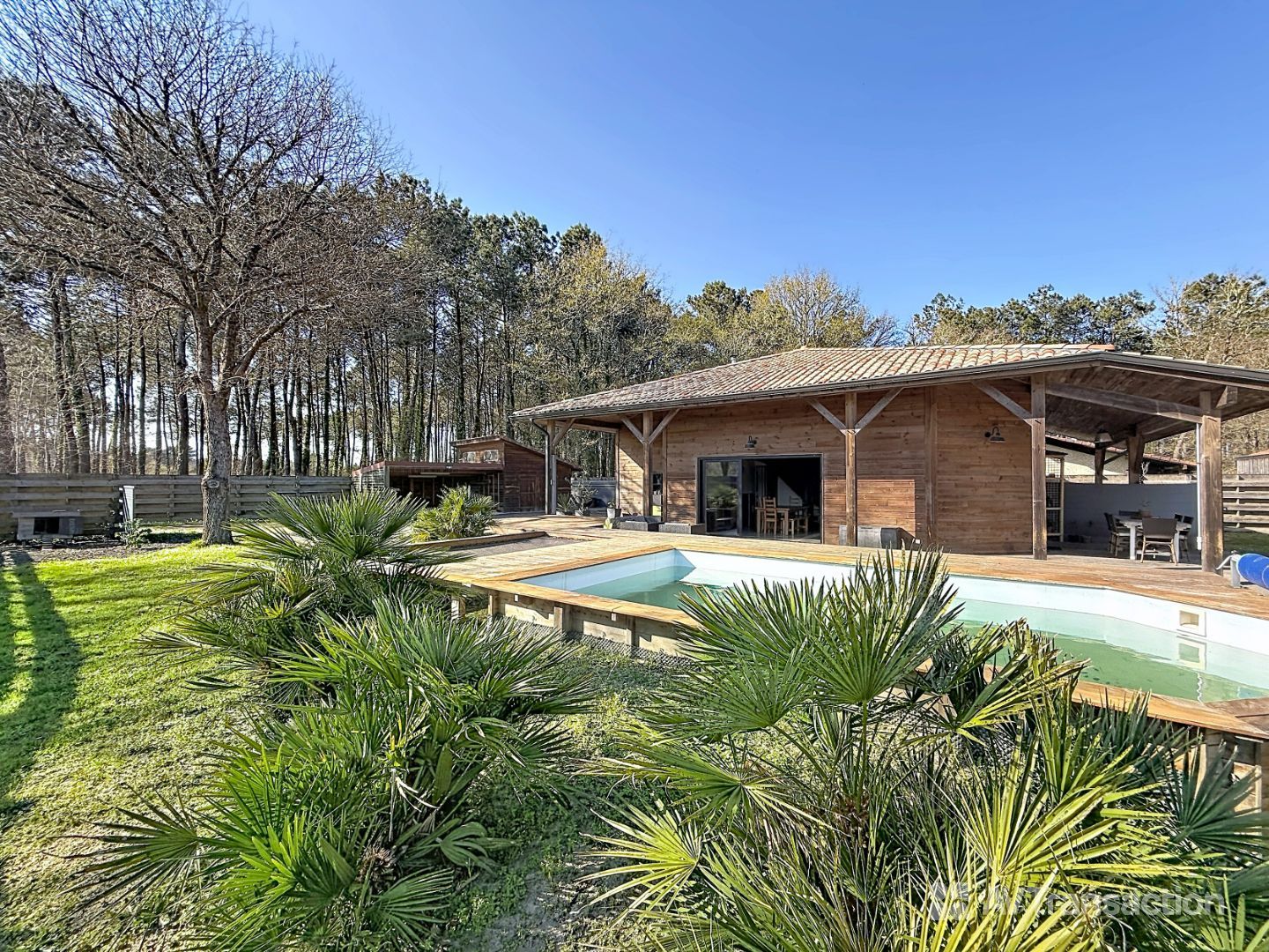 Maison ossature bois au cœur des pins – entre lac et océan