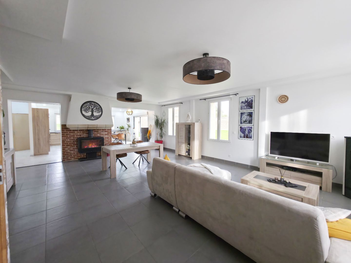 Maison rénovée avec hangar et logement loué – Caudry