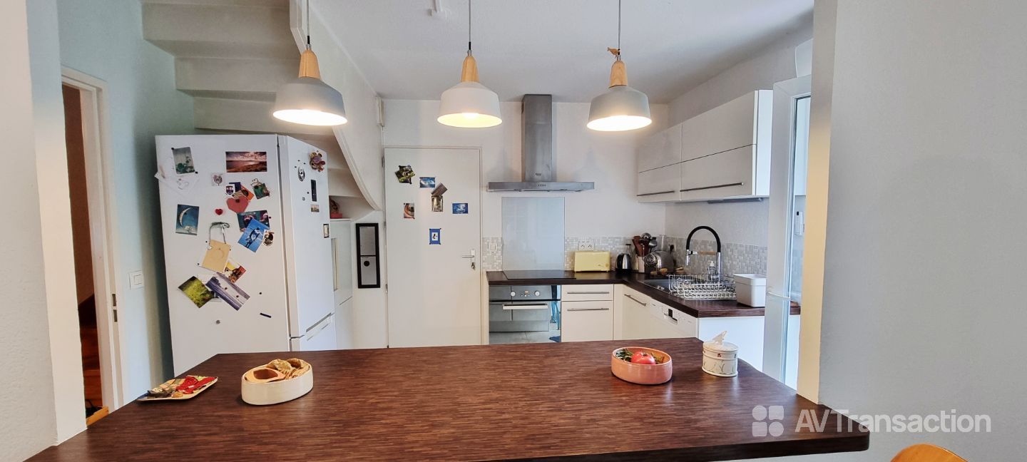 MAISON Mitoyenne en duplex