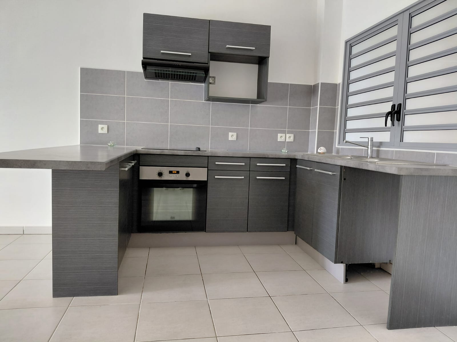 À VENDRE – APPARTEMENT T3 AVEC JARDIN PRIVATIF 